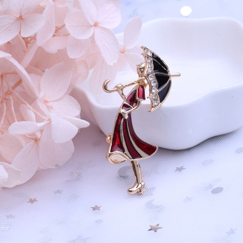 厂家直销外贸热销滴油撑伞雨衣胸针西装毛衣配饰产品图