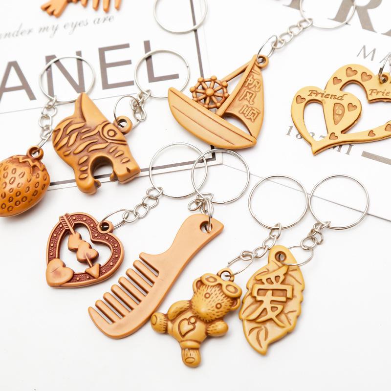 Super cute very creative wood imitation wood key chain mobile phone chain series mixed with a variety of expressions