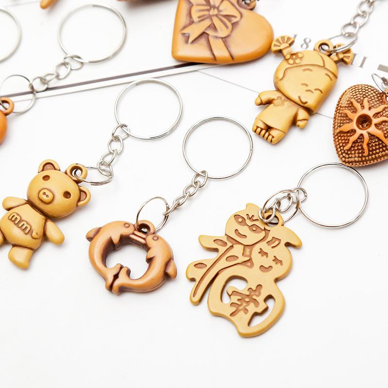 Super cute very creative wood imitation wood key chain mobile phone chain series mixed with a variety of expressions mixed 3