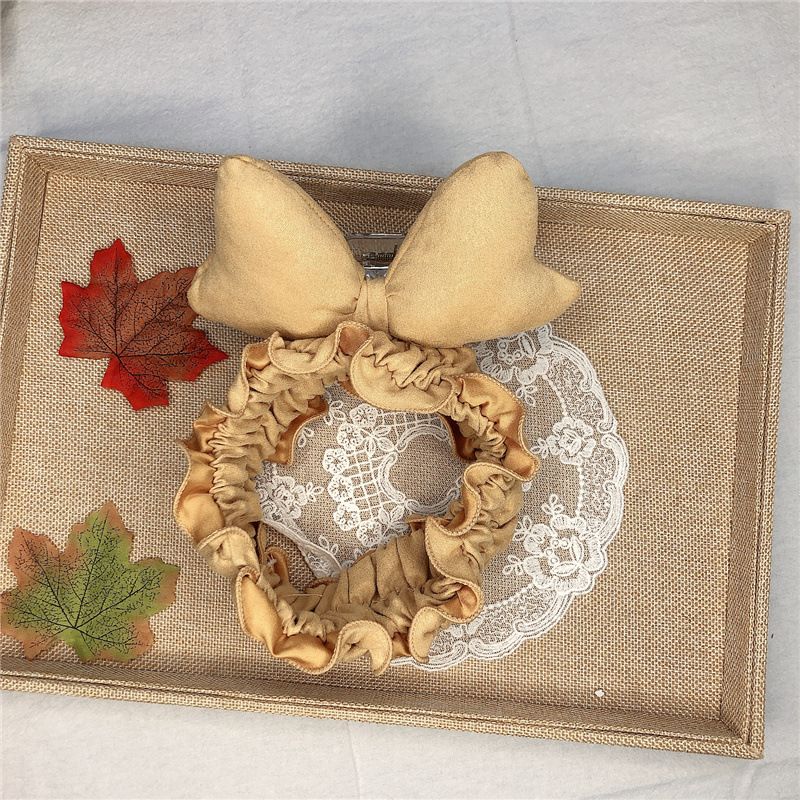 Cute and trendy bow hair band with simple borders. Large bow face wash hair band 5 details Picture