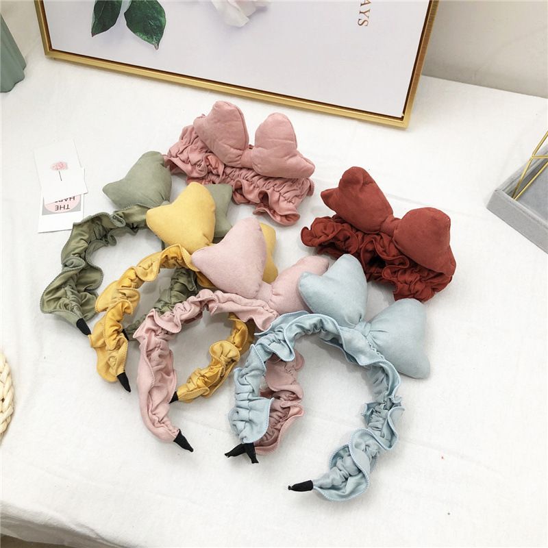 Cute and trendy bow hair band with simple borders. Large bow face wash hair band 5 Specification image