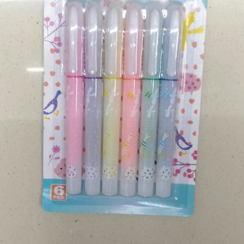 Tattoo pen, fluorescent note pen, pencil sharpener, ballpoint pen
