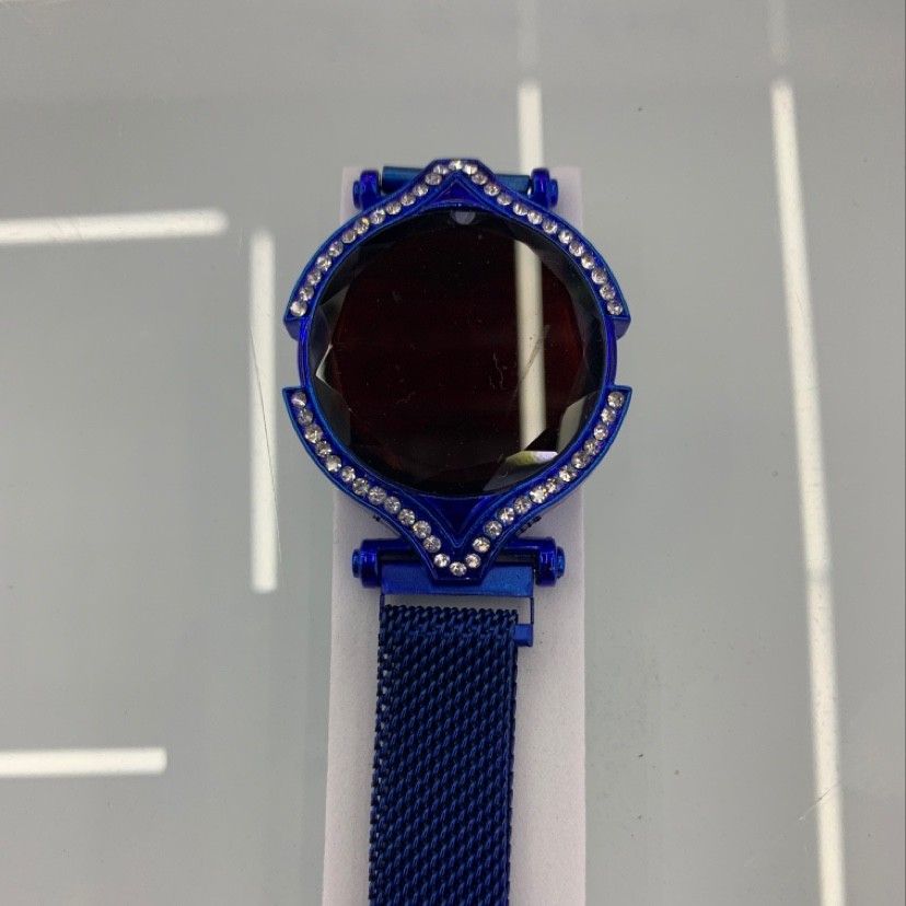 Blue electronic watch with diamonds detail image 1