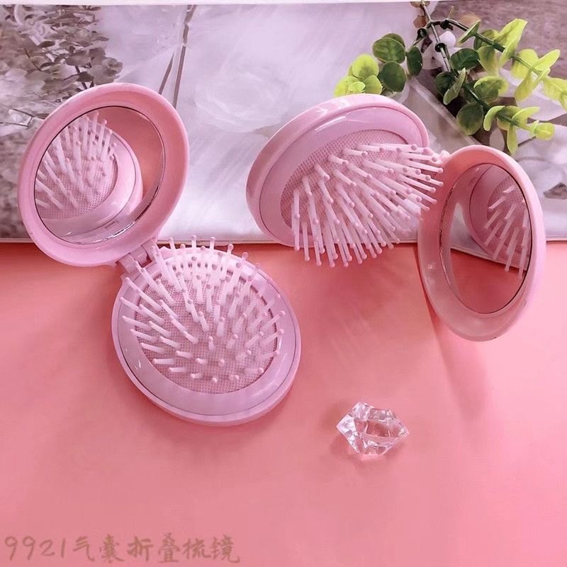 可爱粉色折叠梳子产品图