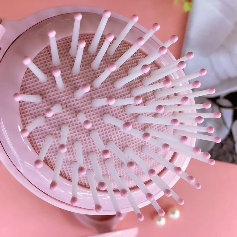 花开木木椭圆形折叠按摩镜梳便携韩版可爱梳详情5