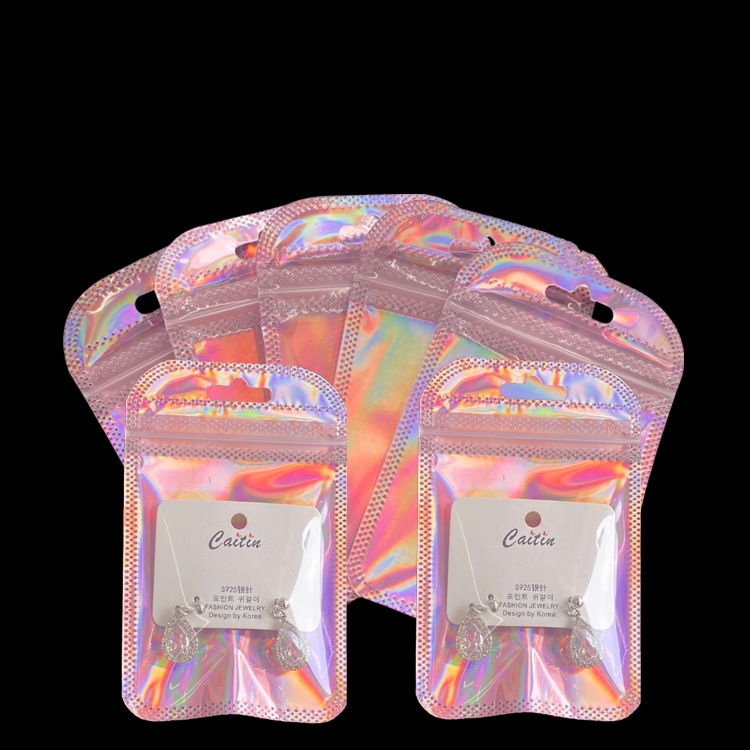 Semi-transparent and cute pinkish-purple collarbone bag, glittering laser rainbow-colored earrings, packaging bag 6.5×24cm Specification image