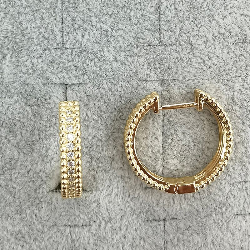 Bilateral zircon straight needle ear buckles