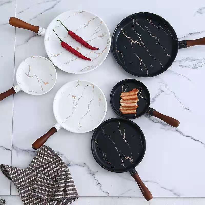 Simple matte gold marble-patterned ceramic dinner plates, European-style pizza plates with bamboo handles, household round plates wholesale detail image 2