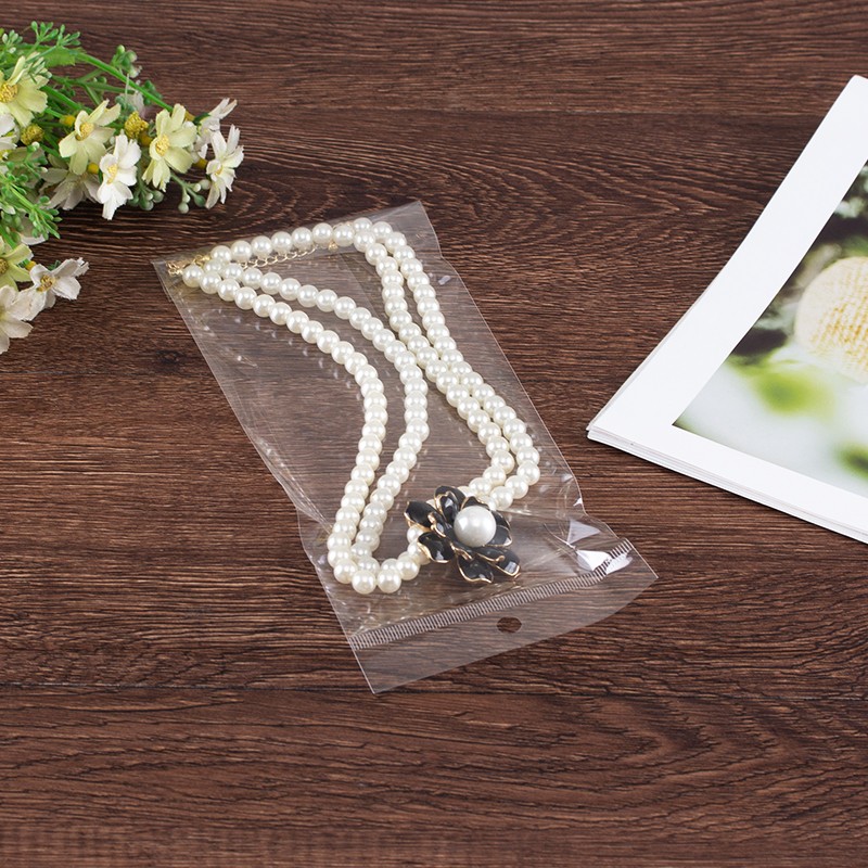 OPP挂孔自粘袋 饰品包装袋 耳环耳钉卡袋子透明塑料袋100个4x51详情图1