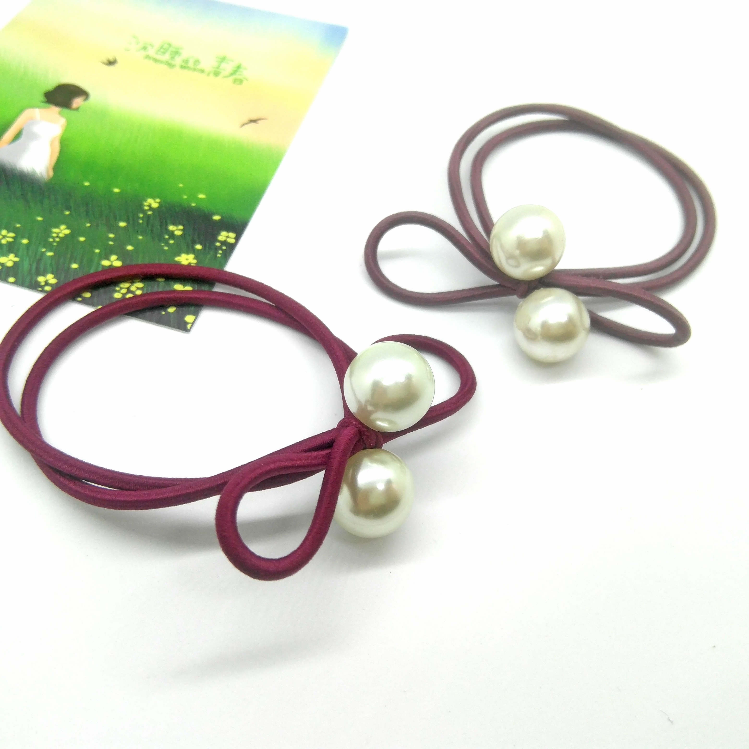 Tie a large pearl bow with a round rubber band detail image 9