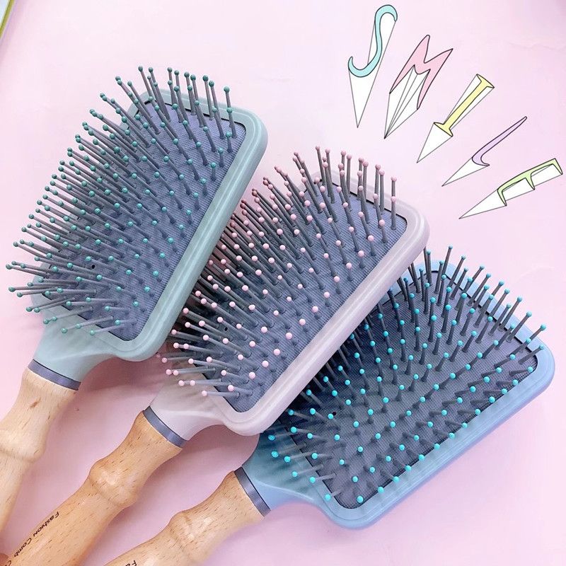 榉木手柄按摩梳白底实物图