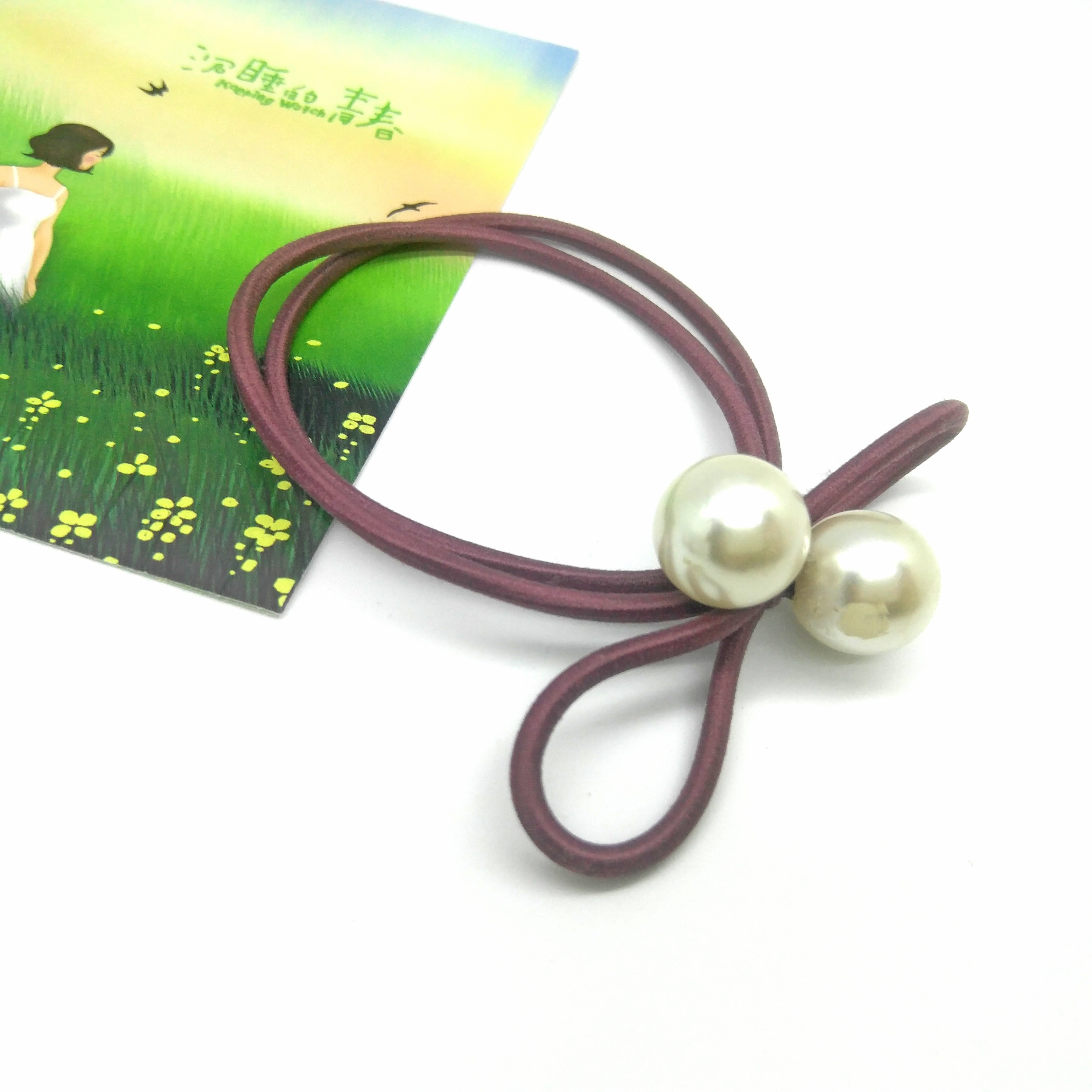 Tie a large pearl bow with a round rubber band detail image 1