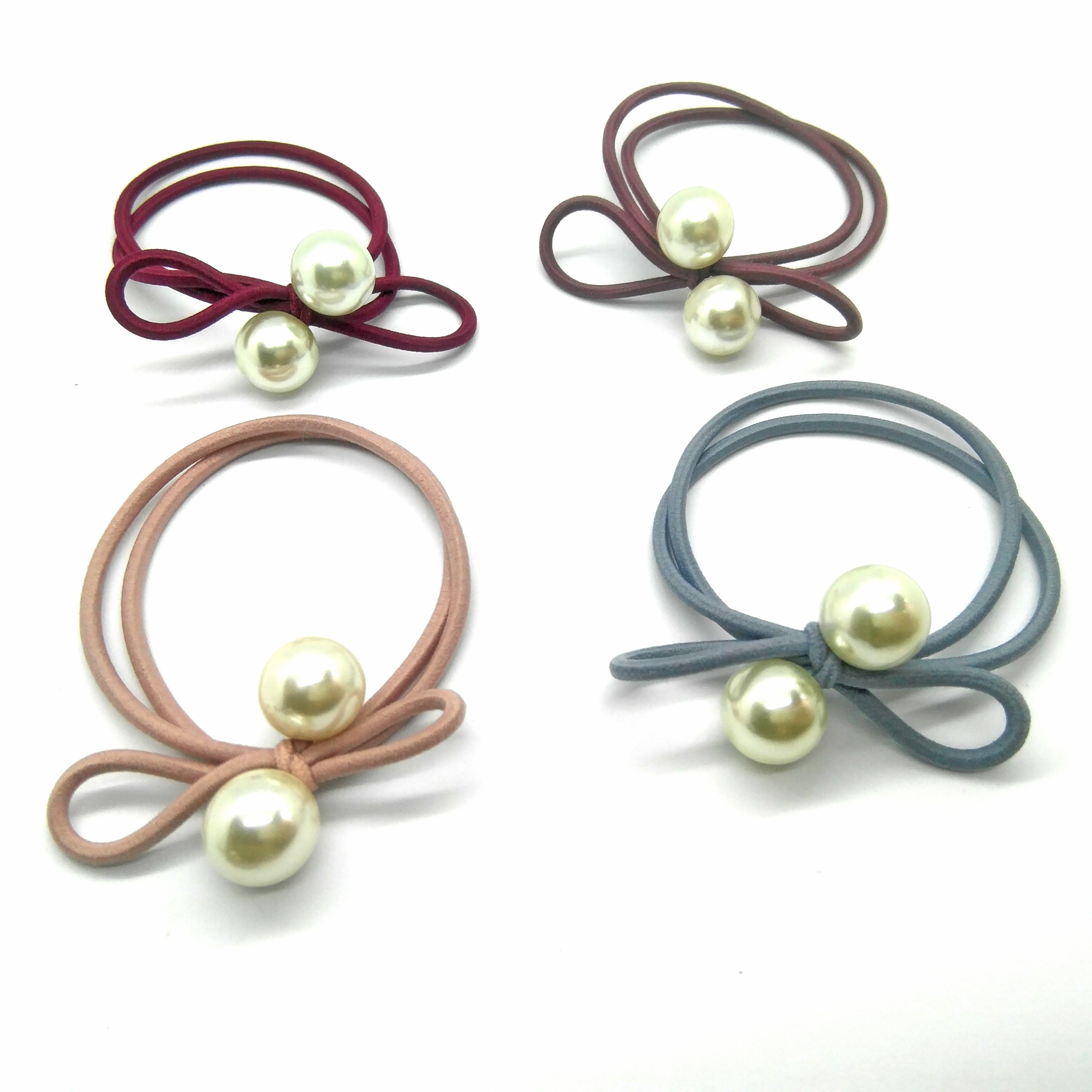 Tie a large pearl bow with a round rubber band detail image 3
