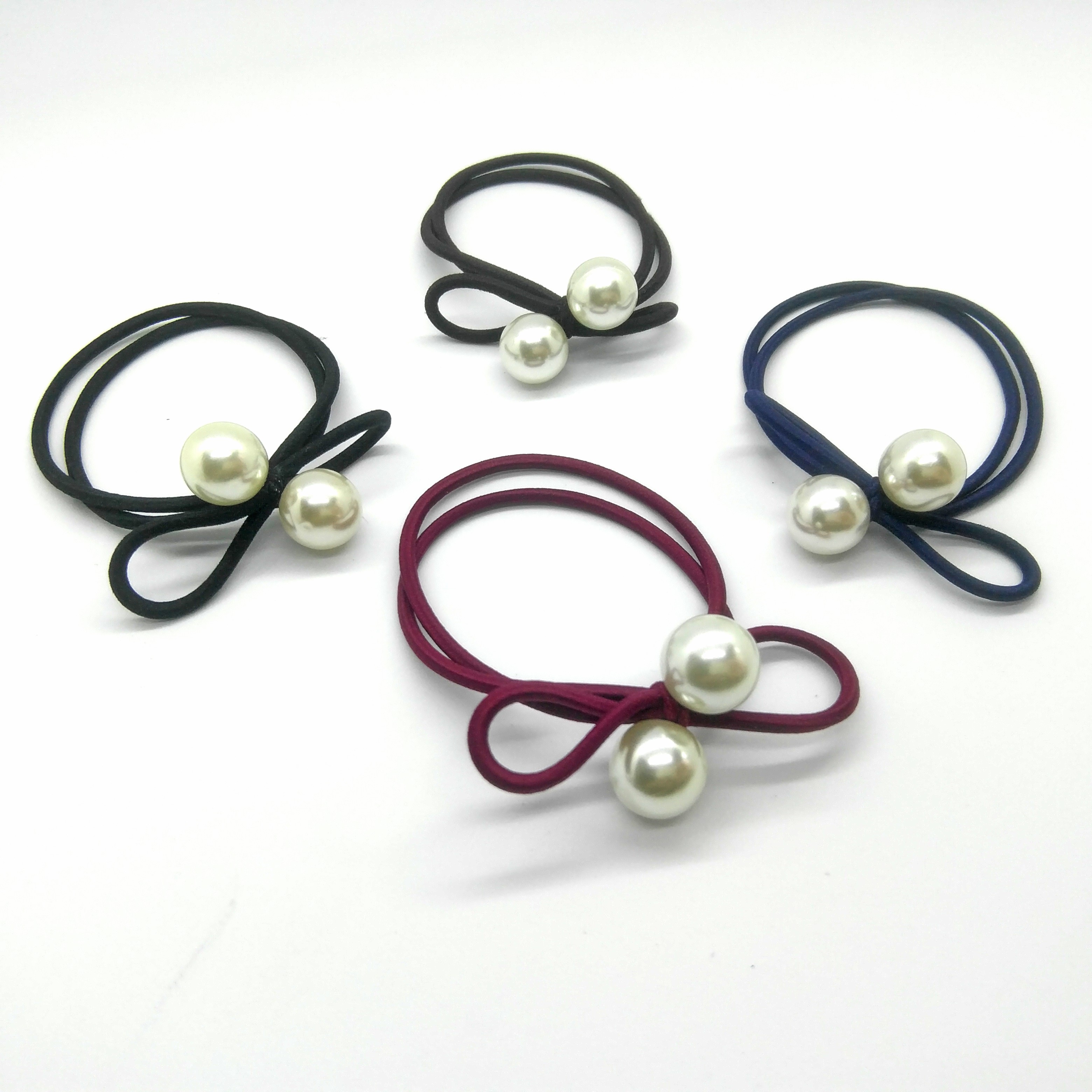 Tie a large pearl bow with a round rubber band detail image 5