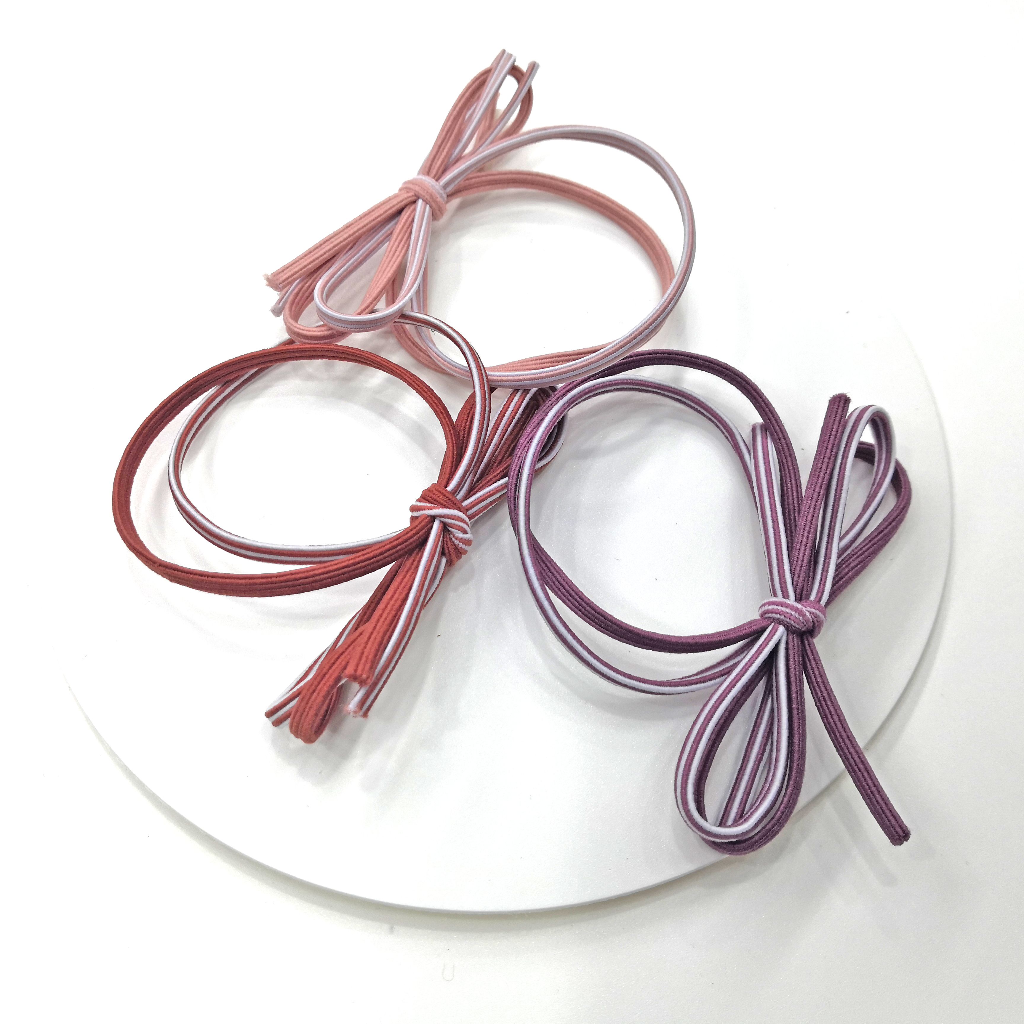 Tie single or double-color bows with round rubber bands