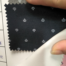 Cloth crown, blue on top.