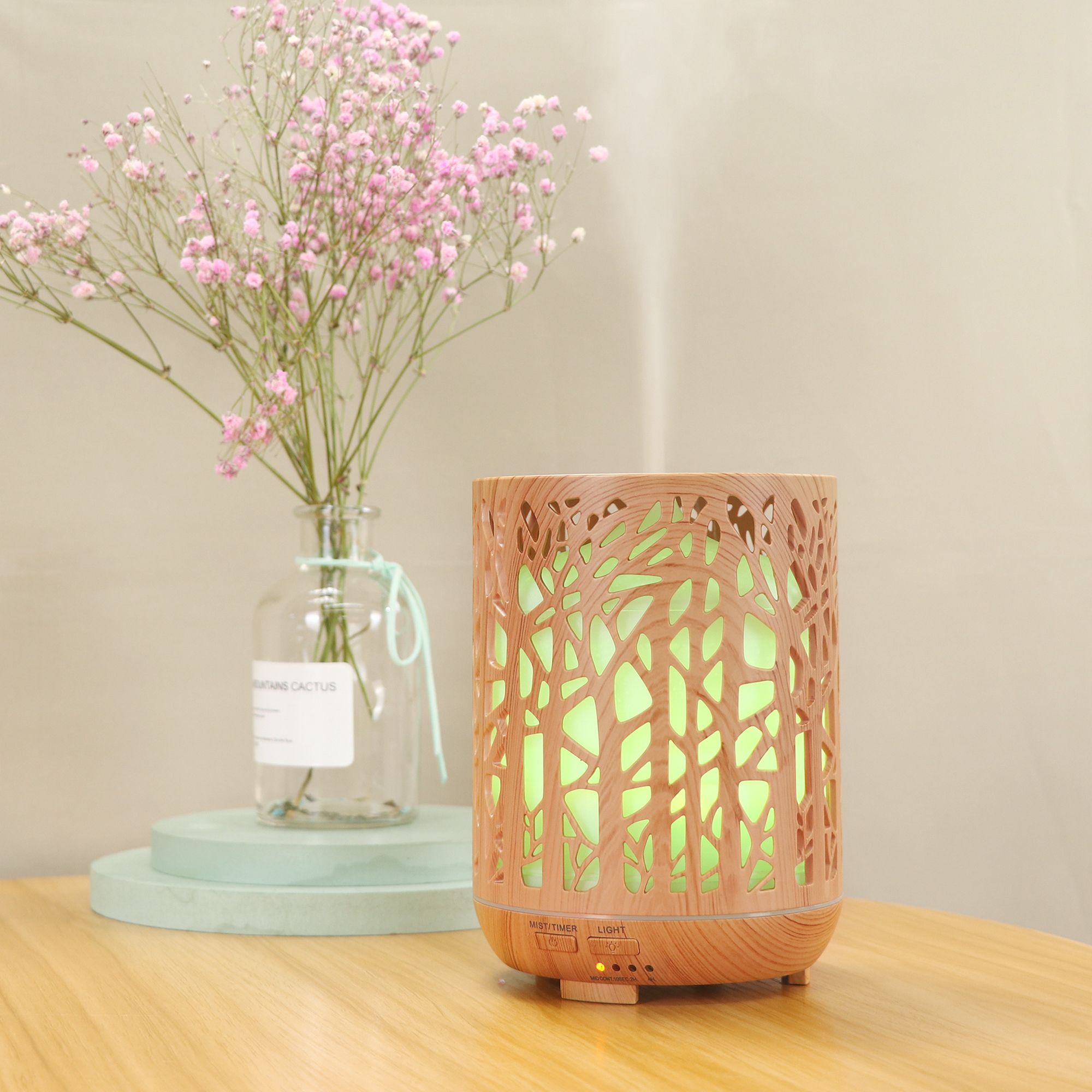 300ML wood grain forest hollowed-out humidifier with seven-color light aroma diffuser Application Scenario