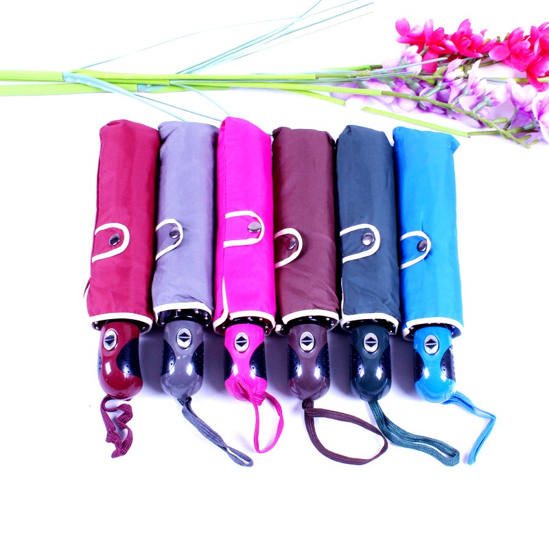 Fully automatic windproof folding umbrella that blossoms when exposed to water detail image 1