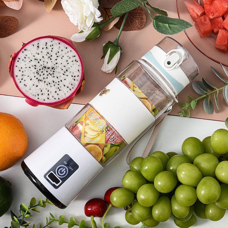 Portable juicer, household small fruit juicer, mini electric cup-shaped juicer, available in pink and green. Please make a note details Picture