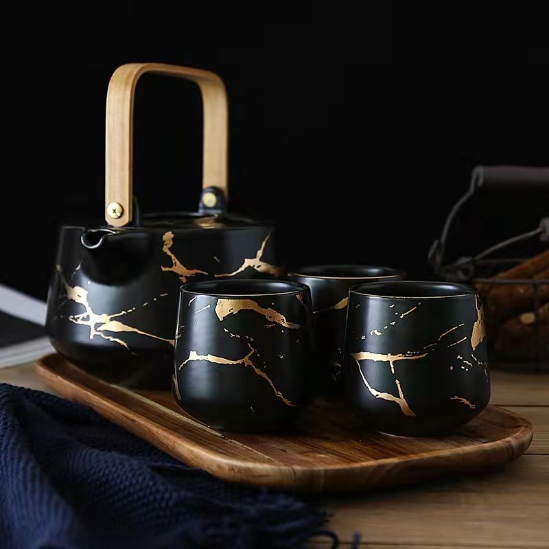 Marble-patterned household tea set: Japanese black and white ceramic afternoon tea cup with acacia wood base teapot details Picture