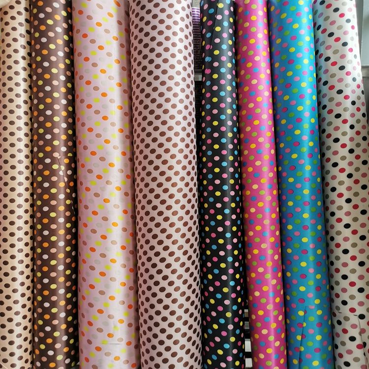 Colección de estampados de colores en dinos estampados de cuatro colores lunares 100% poliéster en la parte inferior con espuma de PVC
