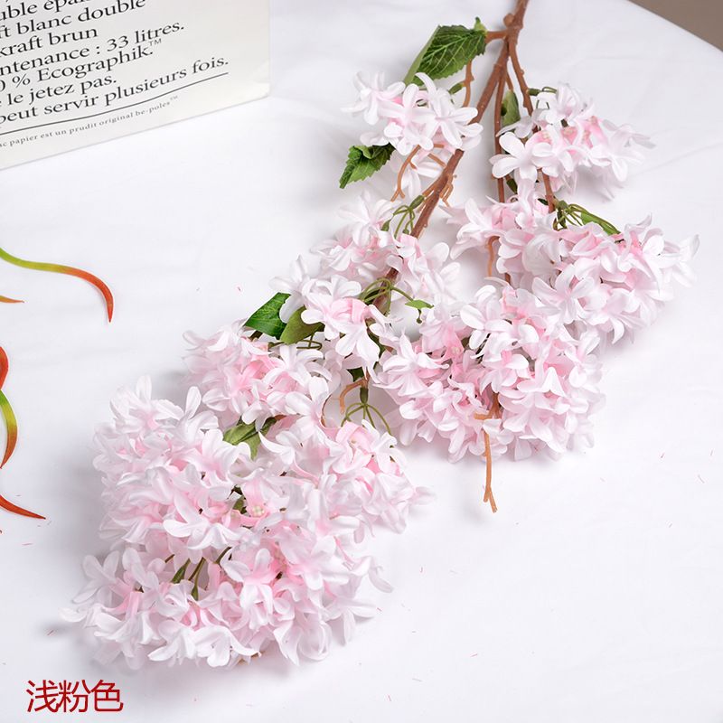 Wedding artificial flowers: lilacs, encrypted cross cherry blossoms, decorative flowers, wedding flower arrangements, arches, venue decoration, artificial flowers details Picture