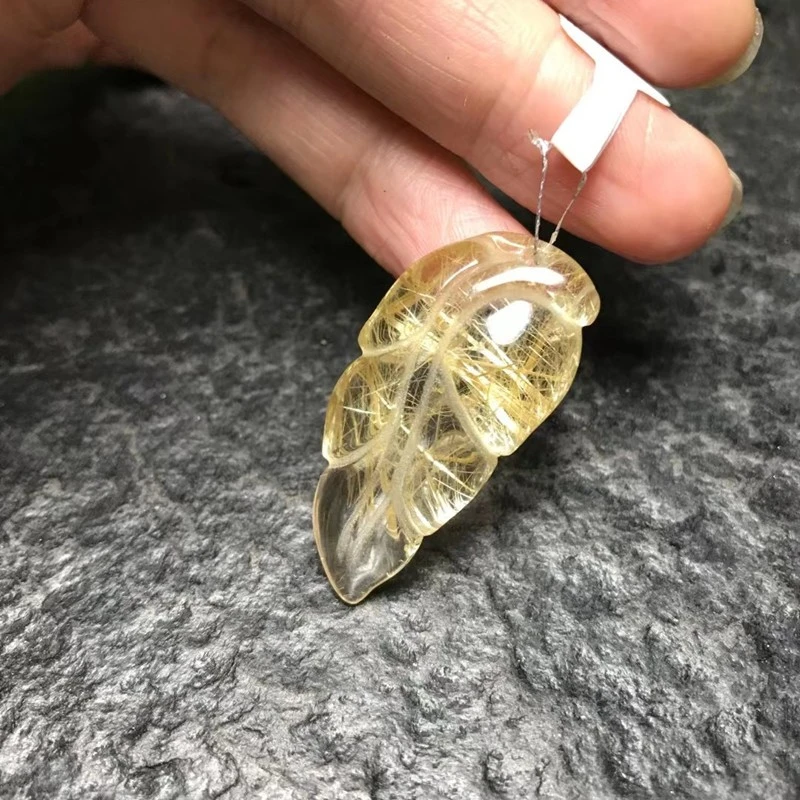 The natural titanium lustrous crystal jewelry pendant with jade branches and leaves is even more beautiful detail image 3