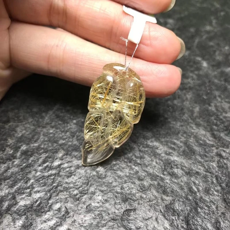 The natural titanium lustrous crystal jewelry pendant with jade branches and leaves is even more beautiful detail image 4