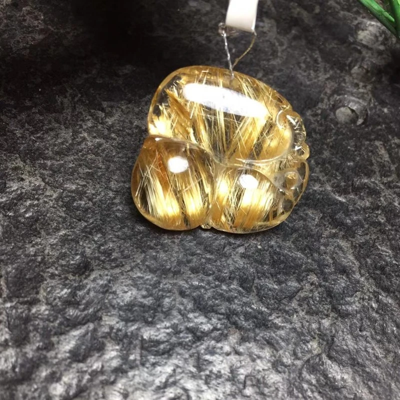 The Bright Color Crystal jewelry Bright Color crystal jewelry natural titanium gold lustrous crystal pendant with a clear ruyi gourd body detail image 1