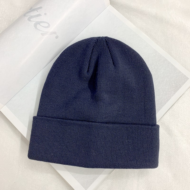 Autumn and winter knitted woolen hats, simple, fashionable and elegant, smooth plate rolled edge hats, Japanese-style Baotou cold hats, European and American trendy ins undefined