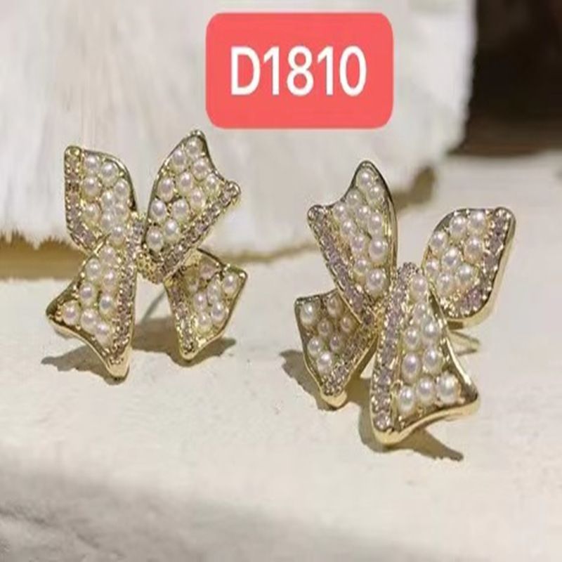 珍珠蝴蝶结新款韩版可爱少女925银针气质耳环简约耳针图