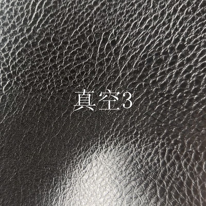 现货批发黑色拉毛底PVC人造革   各色花纹黑色便宜款杂料箱包面料细节图