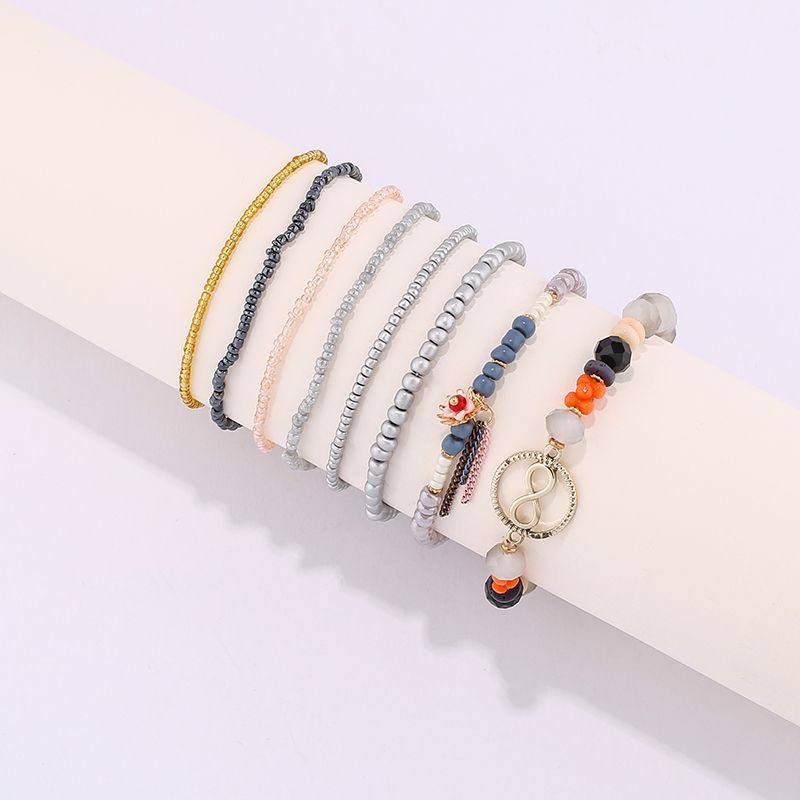 Creative 8-character theme multi-layer rice beads hand string anklet natural stone water lily tassel everything bracelet crystal beads hand string manufacturer direct sales thumbnail