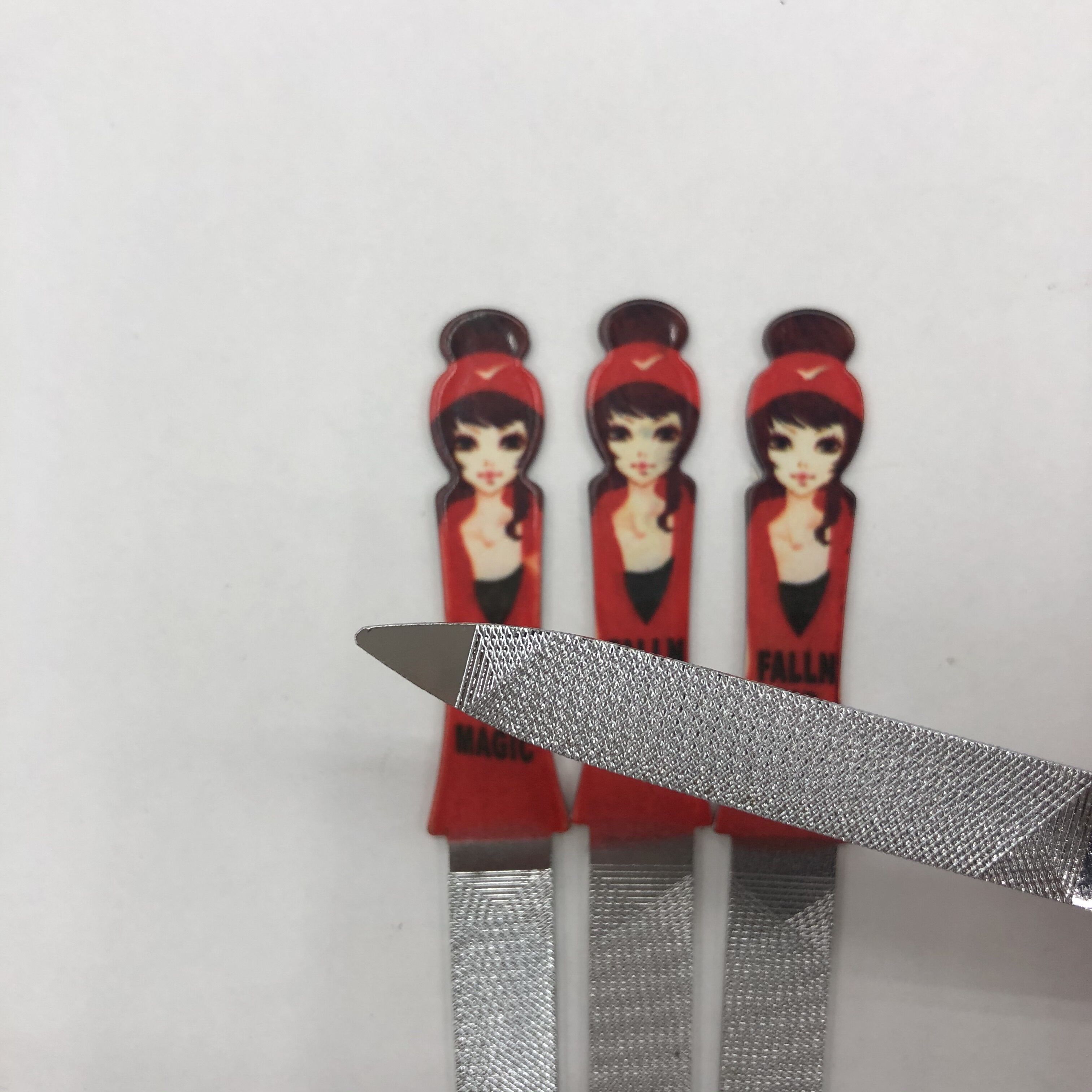 Stainless steel nail file Single-ended nail file cuticle fork Plastic handle nail file Nail manicure cuticle remover tool Manicure trimmer Application Scenario
