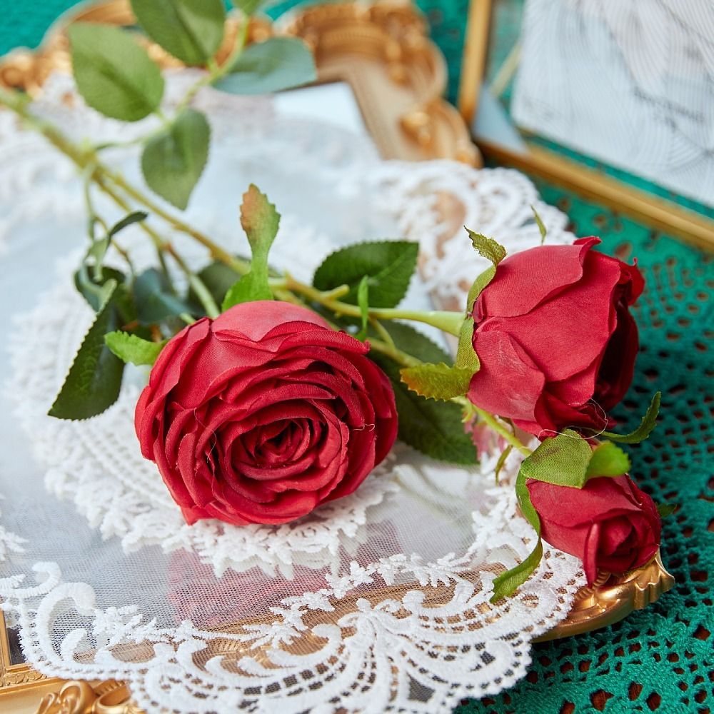 Wholesale and retail of 3-head imperial rose artificial flowers, artificial rose for dining tables, artificial flowers for rural soft furnishings, and silk flowers details Picture