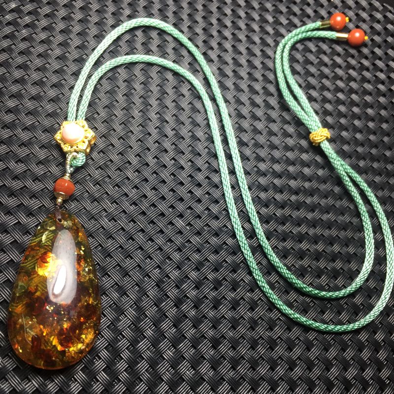 亮彩晶珠宝   天然花珀毛衣链  设计独特  简单大方