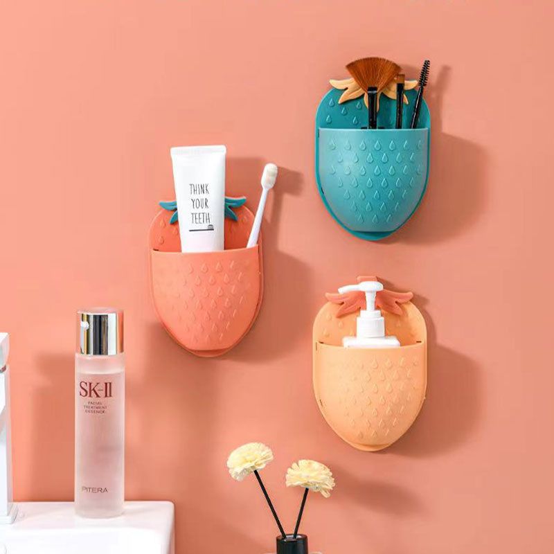 Multi-functional strawberry storage rack, wall-mounted, non-drilling bathroom, new washbasin, toothbrush holder, comb, toothpaste storage box Application Scenario
