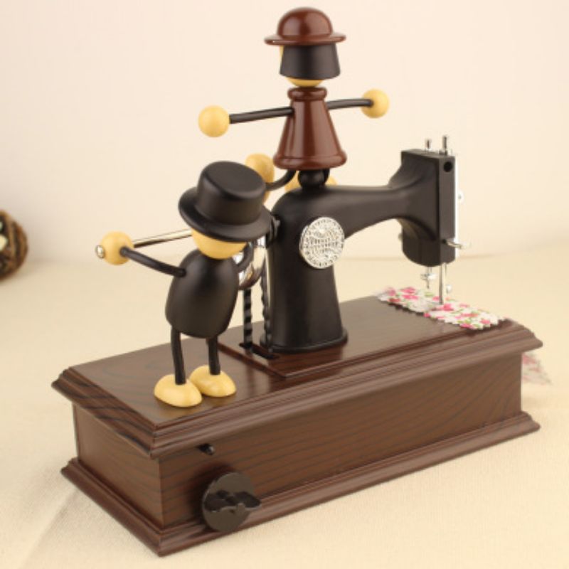 Imitation wooden sewing machine spring, retro music box, jewelry box, romantic couple puppet, music box, creative gift Specification image