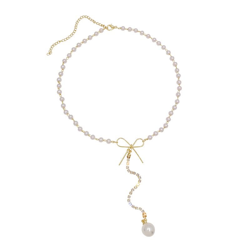 Korean version luxurious and elegant bow long pearl tassel pendant necklace, light luxury goddess style collarbone chain Item Picture