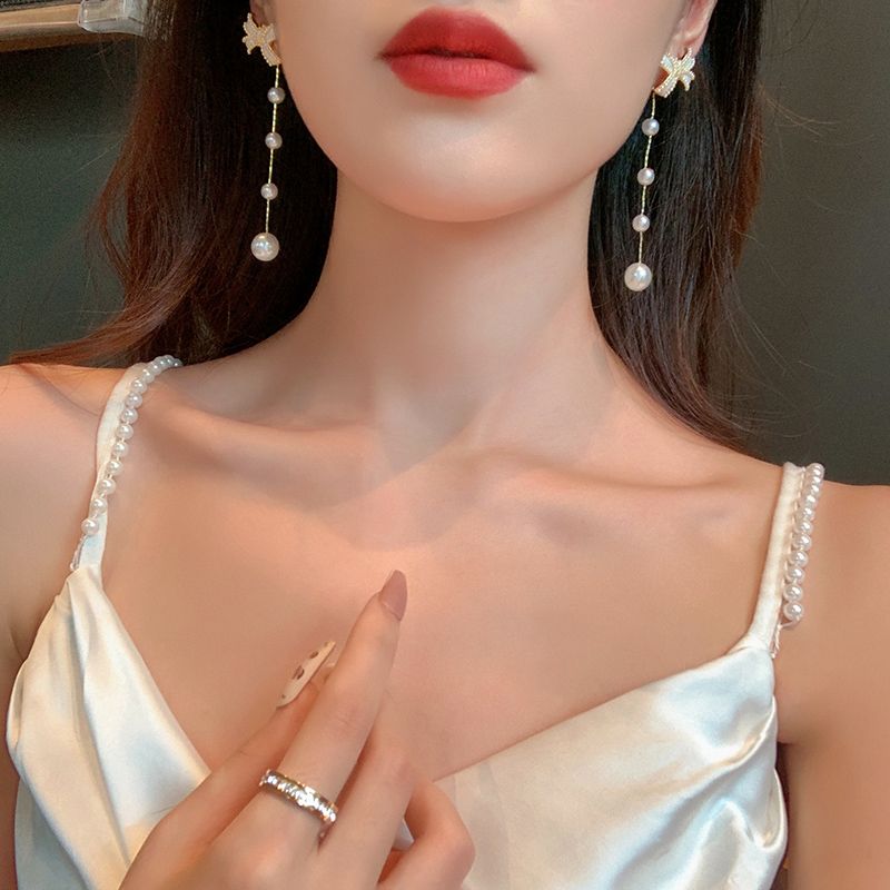 高级感蝴蝶结珍珠耳环女秋季2021新款小众设计耳钉耳夹银针耳饰