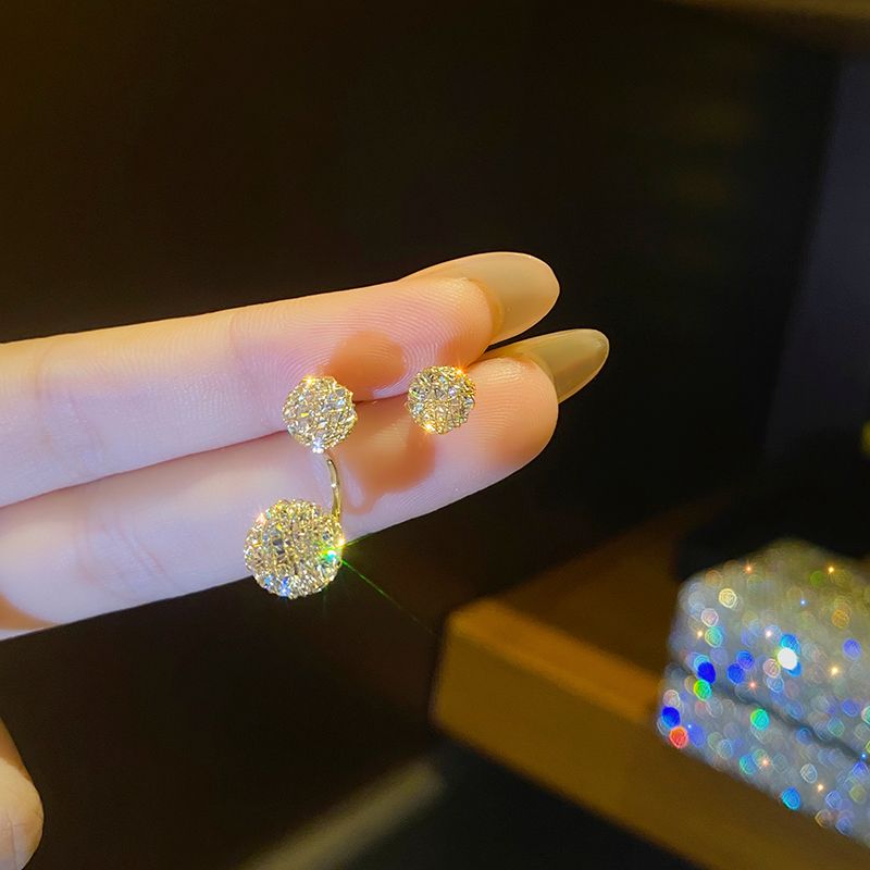 The multi-style grid zircon round stud earrings are a unique and trendy accessory for women with a light luxury and high-end feel in 2021 Application Scenario
