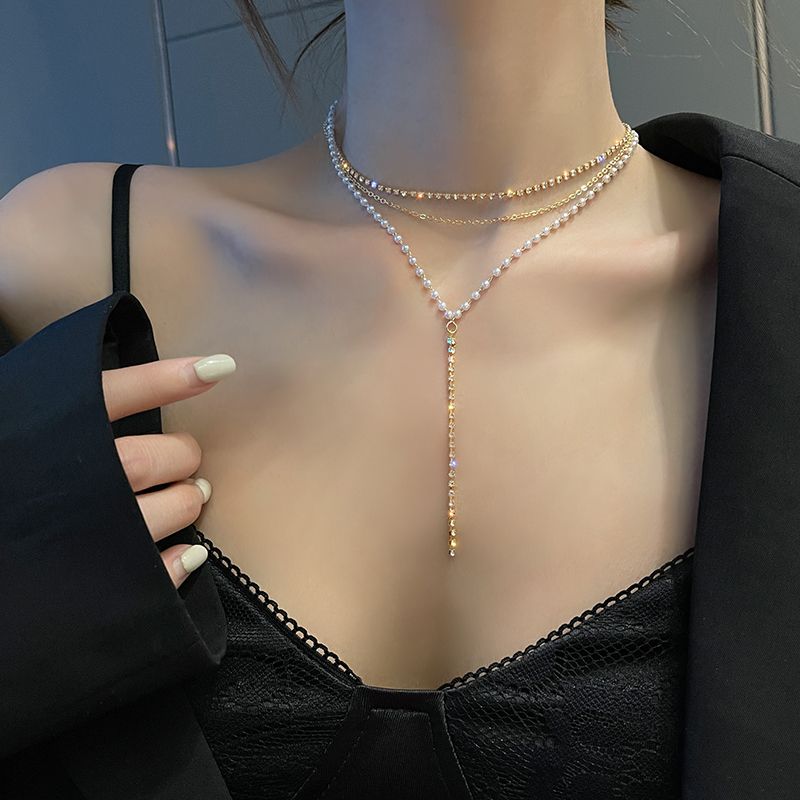 Korean-style light luxury multi-layer sparkling diamond Y-shaped pearl necklace, a niche design for women's collarbone neck accessories details Picture