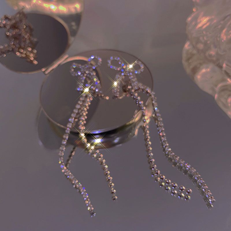 Korean-style light luxury sparkling diamond bow earrings, 2021 new trendy tassel long earrings, women's ear clips and stud earrings Specification image