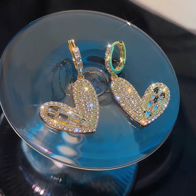 Korean earrings 2021 New trendy diamond small heart style slightly set zircon stud earrings, teenage earrings and stud earrings Application Scenario