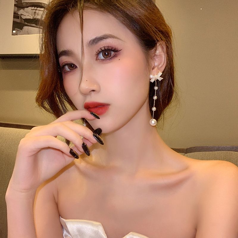 High-end bow pearl earrings for women's autumn 2021 new, niche design, stud earrings, ear clips, and silver needle earrings details Picture