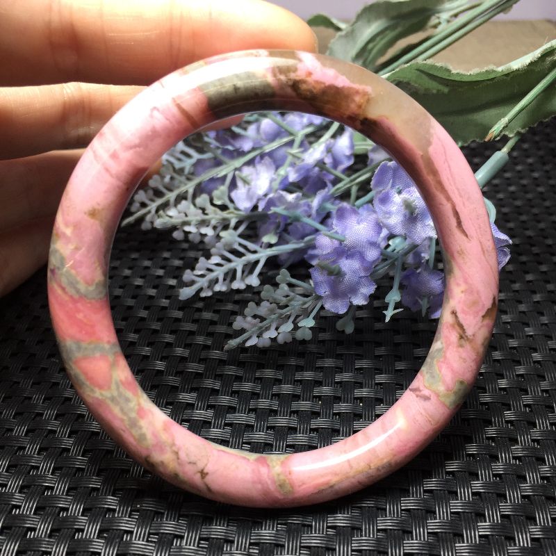 The Bright and colorful Crystal Pearl natural rose pyroxene bracelet features vivid colors