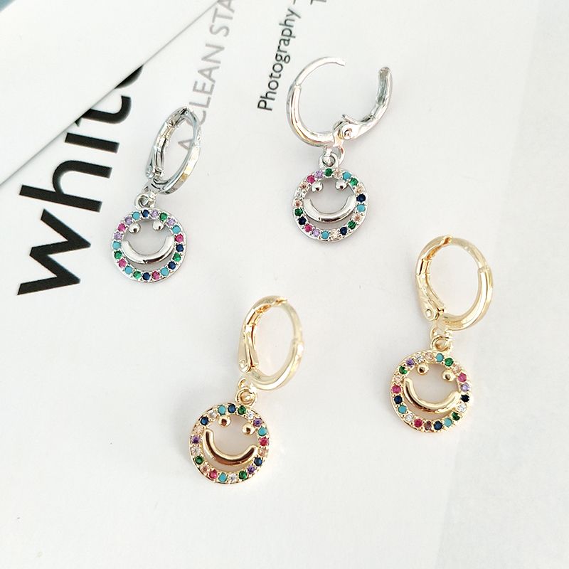 European and American earrings fashion punk copper ear clip smiley face earrings gold studded with colored zircon women's earrings wholesale