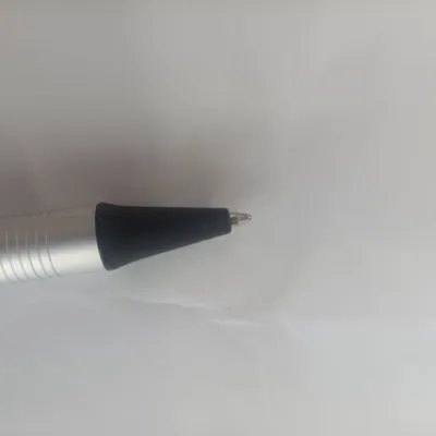 The Metal Rod Presses The Ballpoint Pen