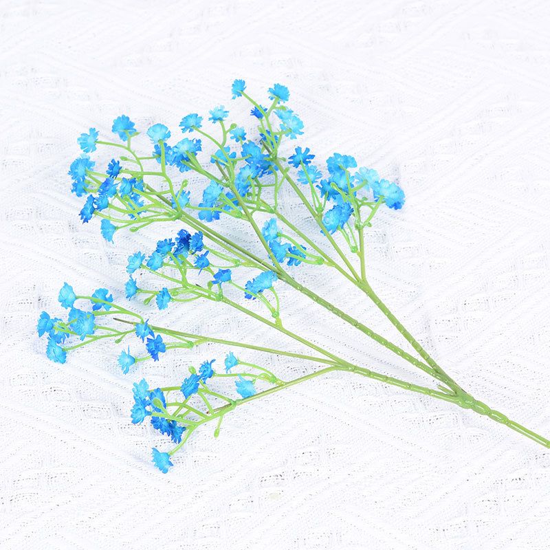 إن اليد المزخرفة التي تحمل باقة من Pu في يوم زفافها، والتي تحمل نجمة كاملة، تشبع بالألوان Item Picture