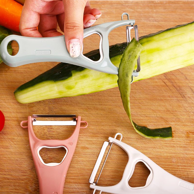 Multi-functional peeler, three-in-one kitchen fruit and vegetable peeler, multi-purpose rotary peeling and peeler, grater, color available randomly full figure